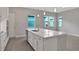 Modern kitchen with stainless steel appliances and white cabinets at 3018 Mirage Pl, St Cloud, FL 34771