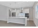 Modern kitchen with stainless steel appliances and white cabinets at 3018 Mirage Pl, St Cloud, FL 34771