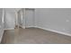 Bright living room featuring tile floors and neutral walls at 3018 Mirage Pl, St Cloud, FL 34771