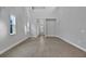 Spacious living room with high ceilings and tile flooring at 3018 Mirage Pl, St Cloud, FL 34771