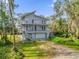 Two-story home with modern design and water access at 7373 Circle Dr, Lady Lake, FL 32159