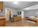 Finished basement with bedroom and kitchenette at 7373 Circle Dr, Lady Lake, FL 32159