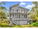 Two story home with elevated deck and garage at 7373 Circle Dr, Lady Lake, FL 32159