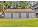 Three-car garage with ample parking space at 7373 Circle Dr, Lady Lake, FL 32159
