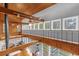 View from the loft overlooking the main living area at 7373 Circle Dr, Lady Lake, FL 32159