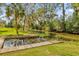 Wooden dock provides access to the water at 7373 Circle Dr, Lady Lake, FL 32159