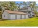 Spacious three-car garage with additional storage at 7373 Circle Dr, Lady Lake, FL 32159