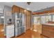 Kitchen boasts stainless steel appliances and ample cabinet space at 7373 Circle Dr, Lady Lake, FL 32159