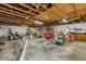 Large garage with high ceilings and workshop area at 7373 Circle Dr, Lady Lake, FL 32159