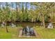 Private dock on calm waterway at 7373 Circle Dr, Lady Lake, FL 32159