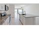 Modern kitchen with stainless steel appliances and granite countertops at 1496 Mirabella Cir, Davenport, FL 33897