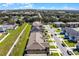 Aerial perspective of townhouses and surrounding landscape at 1496 Mirabella Cir, Davenport, FL 33897