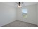 Bright bedroom with carpeted floor and window coverings at 1496 Mirabella Cir, Davenport, FL 33897