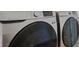Laundry room with modern washer and dryer at 1496 Mirabella Cir, Davenport, FL 33897