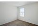 Simple bedroom with neutral walls and carpet at 1496 Mirabella Cir, Davenport, FL 33897