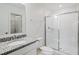 Clean bathroom with granite vanity, shower, and toilet at 1496 Mirabella Cir, Davenport, FL 33897