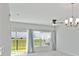 Bright dining room with ceiling fan and access to backyard at 1496 Mirabella Cir, Davenport, FL 33897