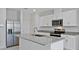 Modern kitchen with stainless steel appliances and granite countertops at 1496 Mirabella Cir, Davenport, FL 33897