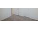 Bright hallway with carpeted floor and white doors at 1496 Mirabella Cir, Davenport, FL 33897