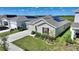 Single-story home with solar panels and landscaped yard at 656 Daring Dr, Davenport, FL 33837