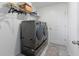 Laundry room with washer, dryer, and shelving at 656 Daring Dr, Davenport, FL 33837