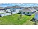 Large backyard with grassy area and privacy fence at 656 Daring Dr, Davenport, FL 33837