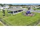 Community park with playground, picnic pavilion and fenced play area at 656 Daring Dr, Davenport, FL 33837