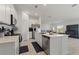Modern kitchen with stainless steel appliances and an island at 656 Daring Dr, Davenport, FL 33837