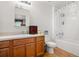 Clean bathroom with shower/tub combo at 218 Ann St, Lady Lake, FL 32159