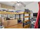 Bedroom with loft bed and workspace at 218 Ann St, Lady Lake, FL 32159