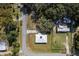 Aerial view showing house location, driveway, and surrounding neighborhood at 218 Ann St, Lady Lake, FL 32159