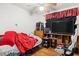 Bedroom with a bed and large TV at 218 Ann St, Lady Lake, FL 32159