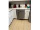 Kitchen boasts stainless steel dishwasher and ample counter space at 620 Gould St, Eustis, FL 32726