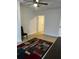 Bright bedroom with light flooring and access to other rooms at 620 Gould St, Eustis, FL 32726