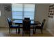 Dining room featuring a wood table and four chairs at 620 Gould St, Eustis, FL 32726