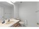 Clean bathroom with toilet and vanity at 5729 King James Ave, Leesburg, FL 34748