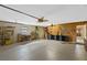 Large garage with ample storage space at 5729 King James Ave, Leesburg, FL 34748