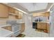 Well-equipped kitchen with ample cabinetry and modern appliances at 5729 King James Ave, Leesburg, FL 34748