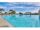 Large outdoor swimming pool with plenty of lounge chairs at 5729 King James Ave, Leesburg, FL 34748