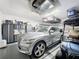 Organized garage with overhead storage and room for two vehicles at 518 Narrow View Ln, Groveland, FL 34736