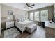 Bright and airy bedroom with a queen-size bed and a plush rug at 518 Narrow View Ln, Groveland, FL 34736