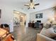 Home office with built-in desk and comfortable seating at 518 Narrow View Ln, Groveland, FL 34736