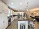 Modern kitchen with a large island and ample cabinet space at 518 Narrow View Ln, Groveland, FL 34736