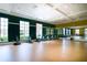 Fitness center with multiple spin bikes and mirrors at 518 Narrow View Ln, Groveland, FL 34736