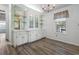 Charming dining area with built-in hutch and water views at 1020 Hilltop Rd, Tavares, FL 32778