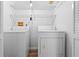 Convenient laundry closet with washer and dryer at 1020 Hilltop Rd, Tavares, FL 32778