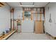 Workshop with pegboard walls and ample storage at 1020 Hilltop Rd, Tavares, FL 32778