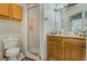 Clean bathroom with shower and wooden vanity at 919 Patrick St, Kissimmee, FL 34741