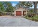 Attached garage with brick driveway at 919 Patrick St, Kissimmee, FL 34741