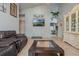 Living area showcasing a comfortable seating arrangement and kitchen views at 919 Patrick St, Kissimmee, FL 34741